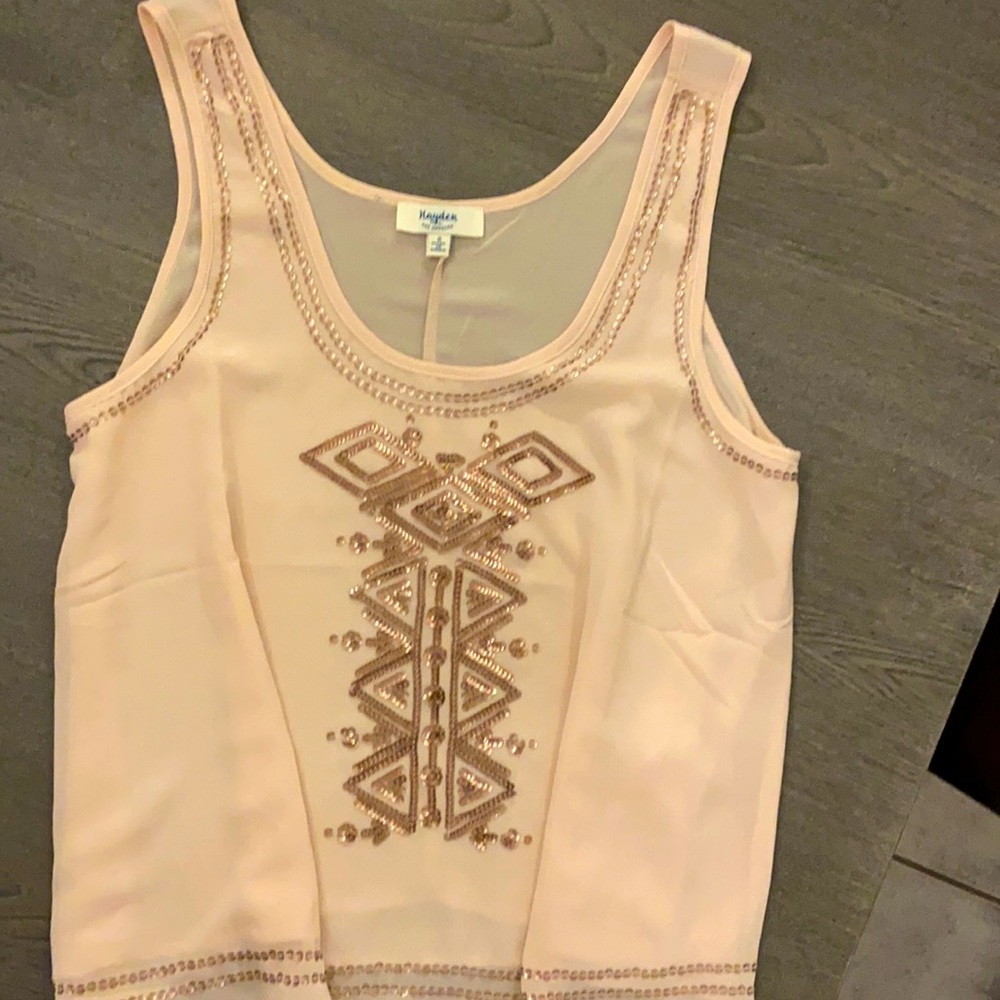 Size small. Loose light peach sequined top. Brand new.
